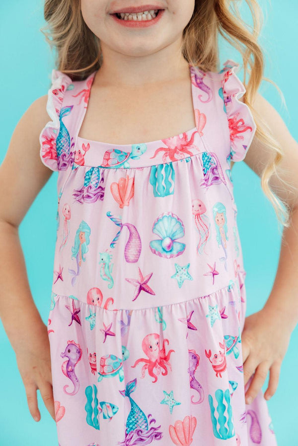 Girls pink ruffle cross back dress ruffle with colorful sea creature print, size for young children