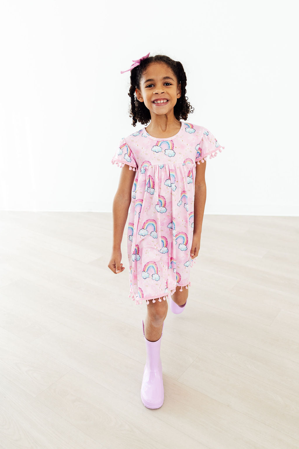 toddler girls pink pom pom dress with rainbow print short sleeves by Mila & Rose