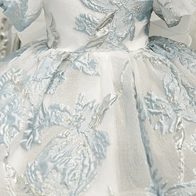 elegant little girls brocade dress in white and light blue for infants with floral textured pattern
