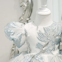Elegant little girls brocade dress in white and light blue with puffed short sleeves for infants
