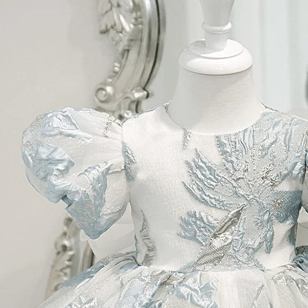 Elegant little girls brocade dress in white and light blue with puffed short sleeves for infants