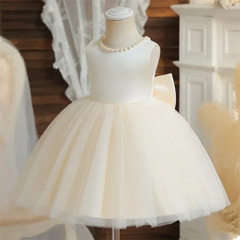 Girls ivory elegant V back dress for girls with pearl neckline and tulle skirt