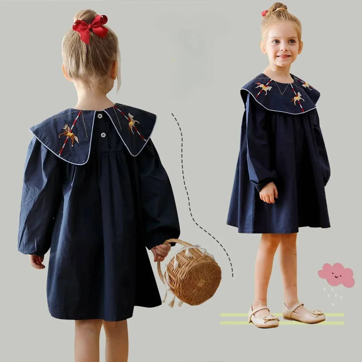 Little girl wearing navy embroidered dress for little girls standing and holding a wicker basket