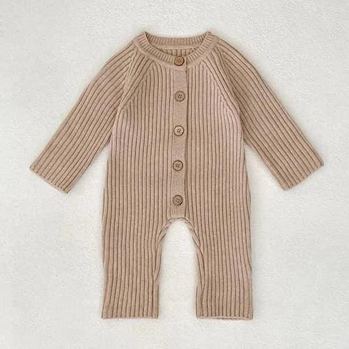 Beige ribbed fall knit baby romper with long sleeves and button closure for infants