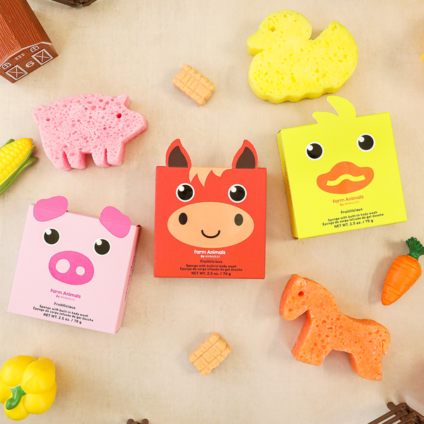 Farm animal bath sponges in pig, cow, and duck shapes with fruitilicious scents and playful vegetable props for kids' bath time.