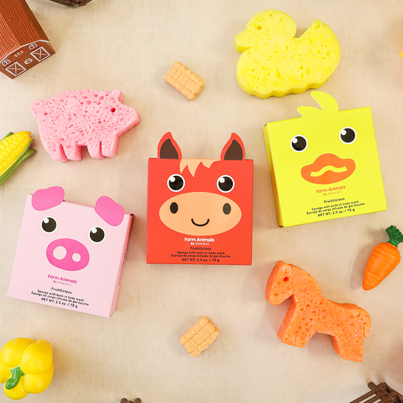 Farm animal bath sponges in pig, cow, and duck shapes with fruitilicious scents and playful vegetable props for kids' bath time.
