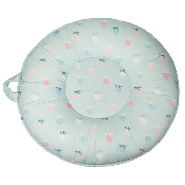 Pastel blue toddler round floor cushion with colorful strawberry pattern and handle