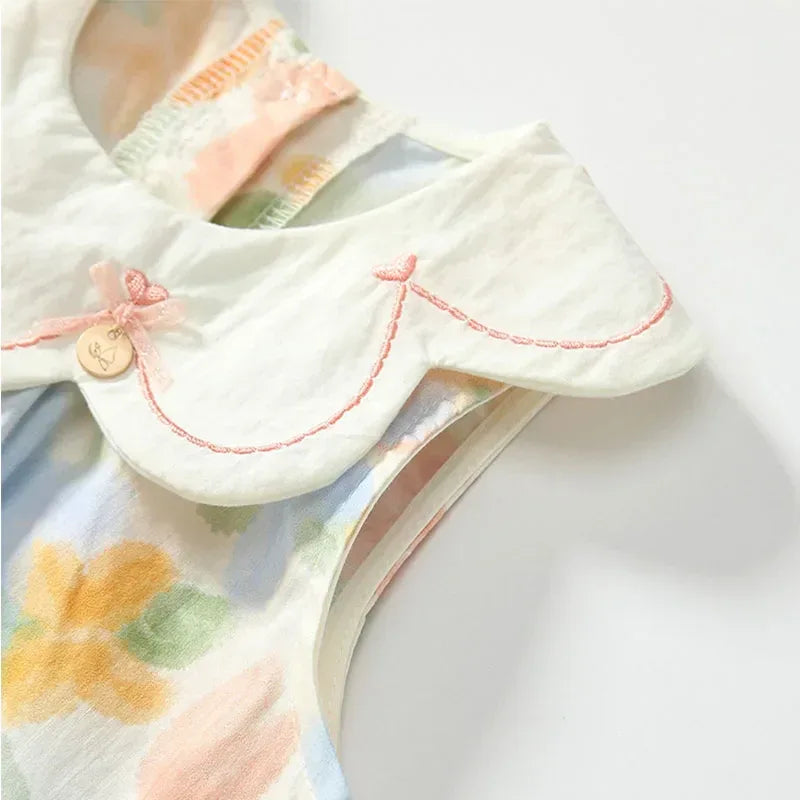 Floral baby dress with lace collar in pastel colors for infants with scalloped edge detail
