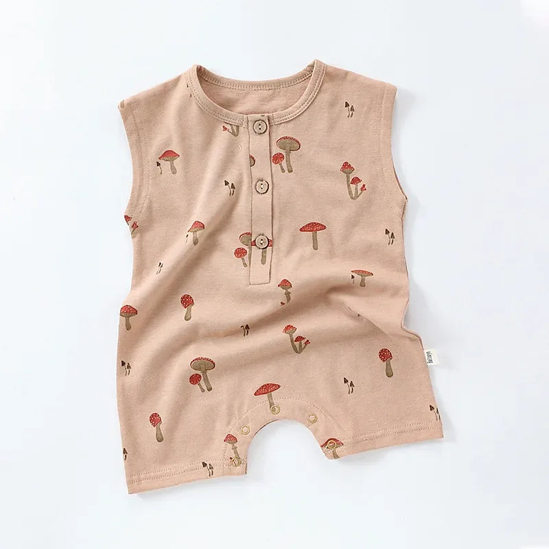 Beige sleeveless floral baby romper with red mushroom print and front buttons for infants