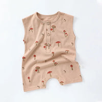Beige sleeveless floral baby romper with red mushroom print and front buttons for infants