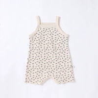 cream floral baby romper for infants with sleeveless straps and all-over flower print