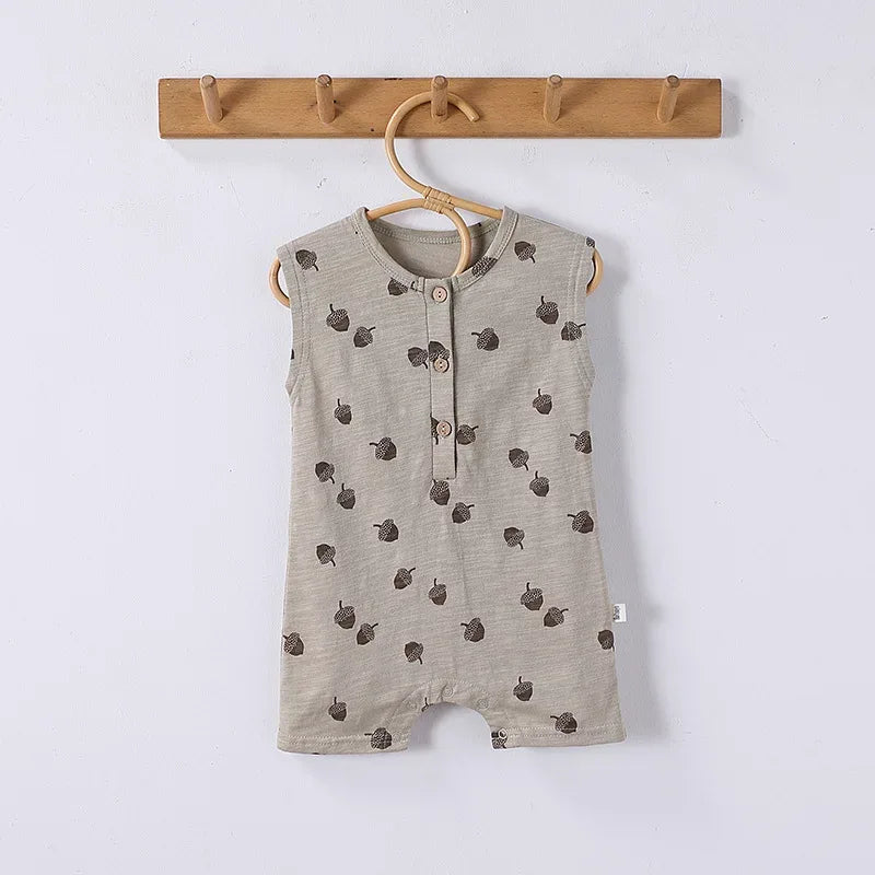 Sleeveless beige floral baby romper with button front for newborns and infants