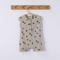 Sleeveless beige floral baby romper with button front for newborns and infants