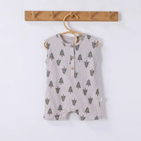 Sleeveless light gray baby romper with green tree floral pattern and wooden buttons