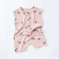 pink sleeveless floral baby romper for infants with button front and grape cluster print