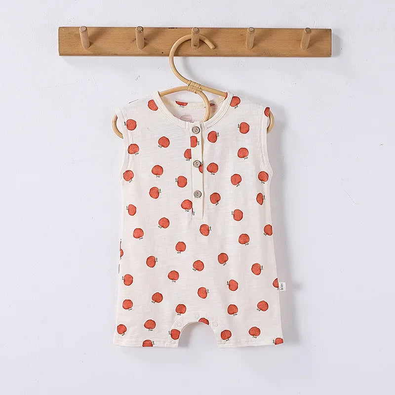 Sleeveless floral baby romper for infants with white background and orange flower pattern