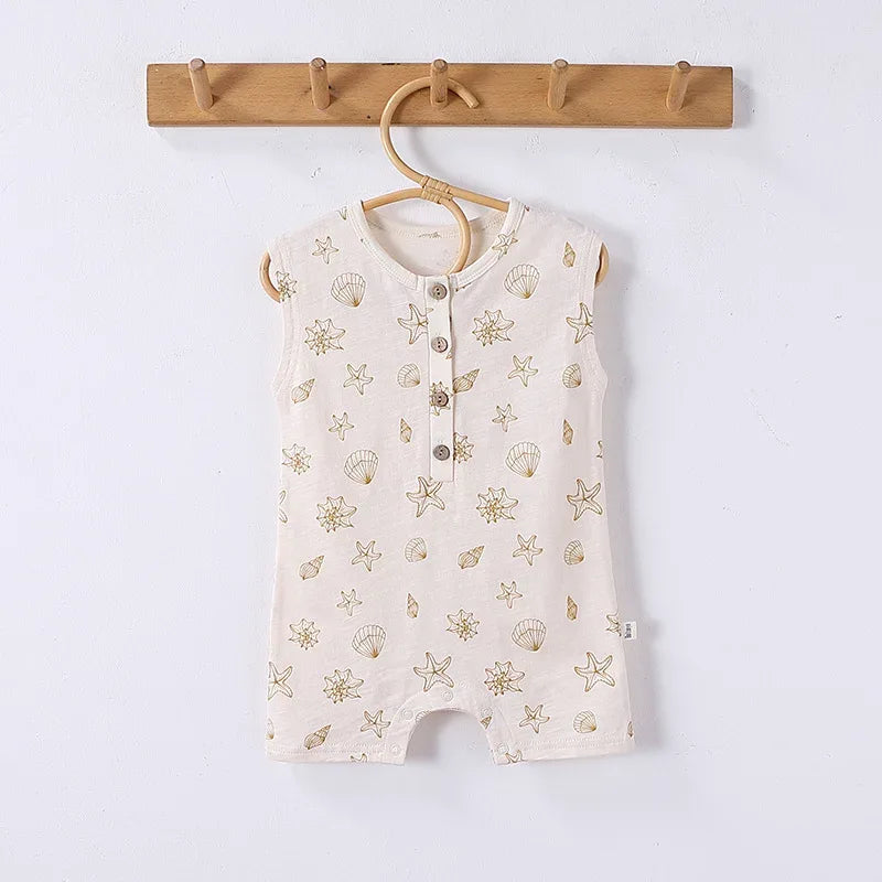 cream floral baby romper for infants with seashell and starfish print sleeveless design