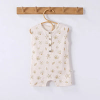cream floral baby romper for infants with seashell and starfish print sleeveless design