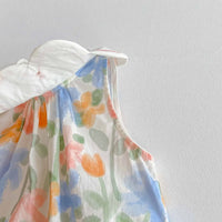 Floral baby romper with embroidered collar in pastel colors for infants