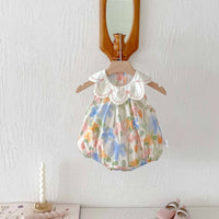 floral baby romper with embroidered collar for infants in pastel colors with scalloped neckline