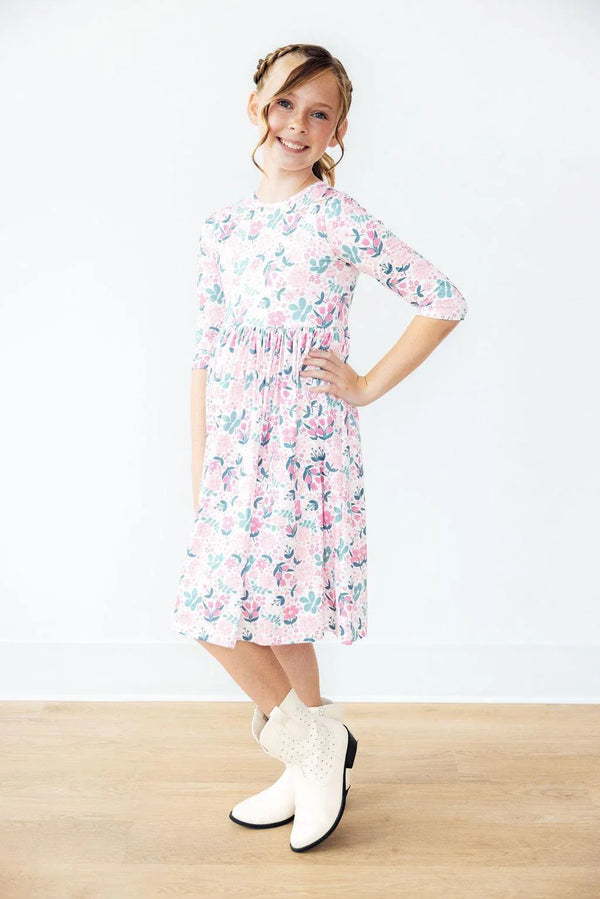 Girls white and pink floral girls twirl dress with 3/4 sleeves and mid-length skirt
