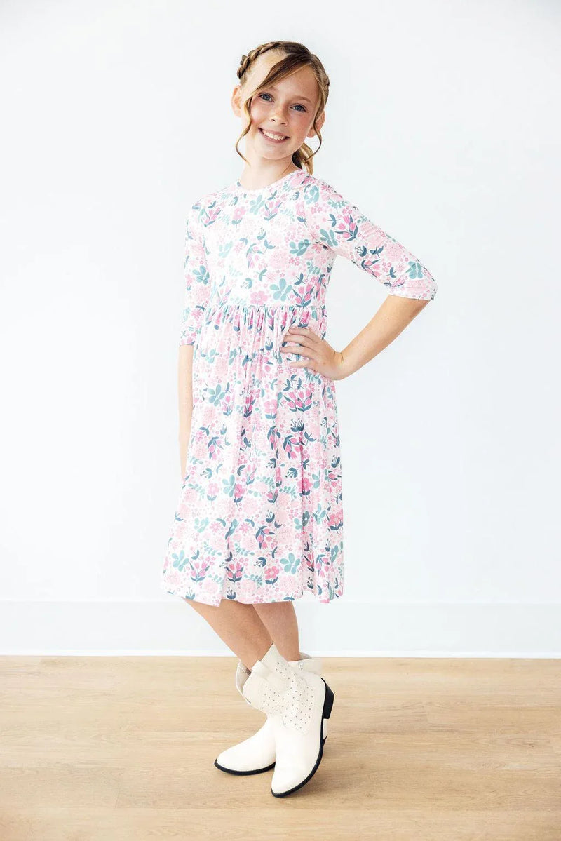 Girls white and pink floral girls twirl dress with 3/4 sleeves and mid-length skirt
