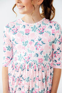 Girls floral girls twirl dress in pink and green with 3/4 sleeves and gathered waist
