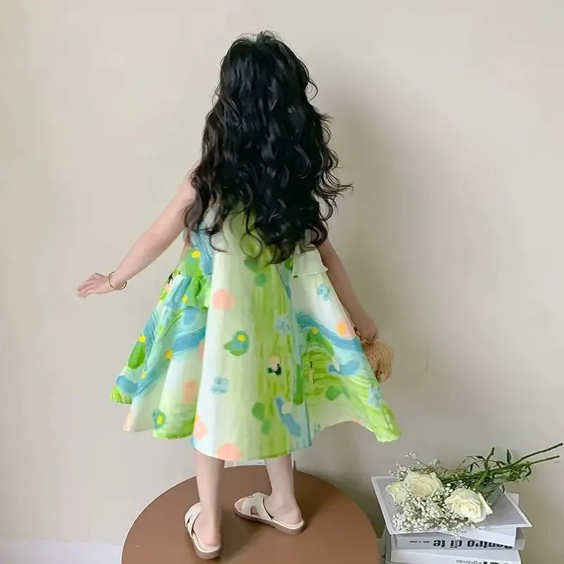 toddler girl wearing a green and blue floral print baby dress with sleeveless design and flared skirt