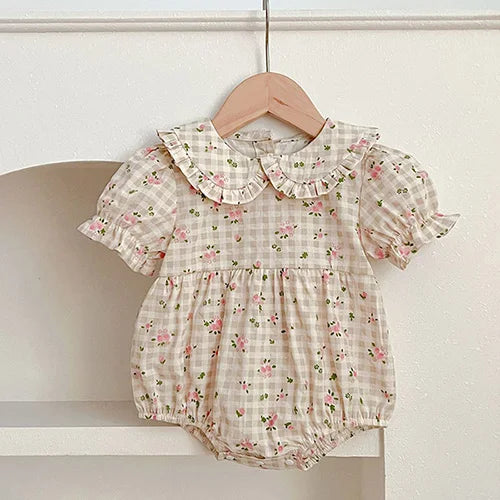 Baby cream floral print romper with ruffled collar and puff sleeves for infants