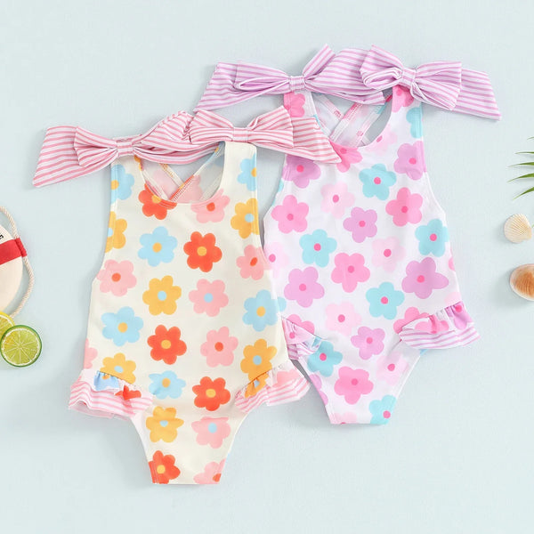 Toddler floral print swimsuits in pastel colors with pink striped bow headbands for girls