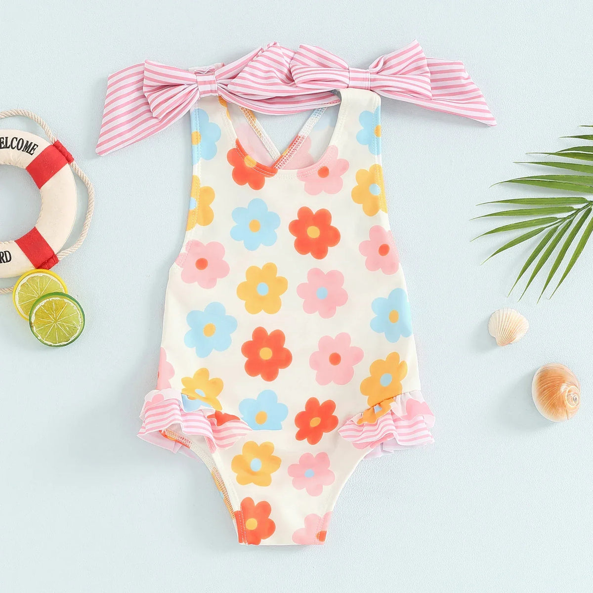 toddler floral print swimsuits for toddlers with colorful flowers and pink striped ruffle details
