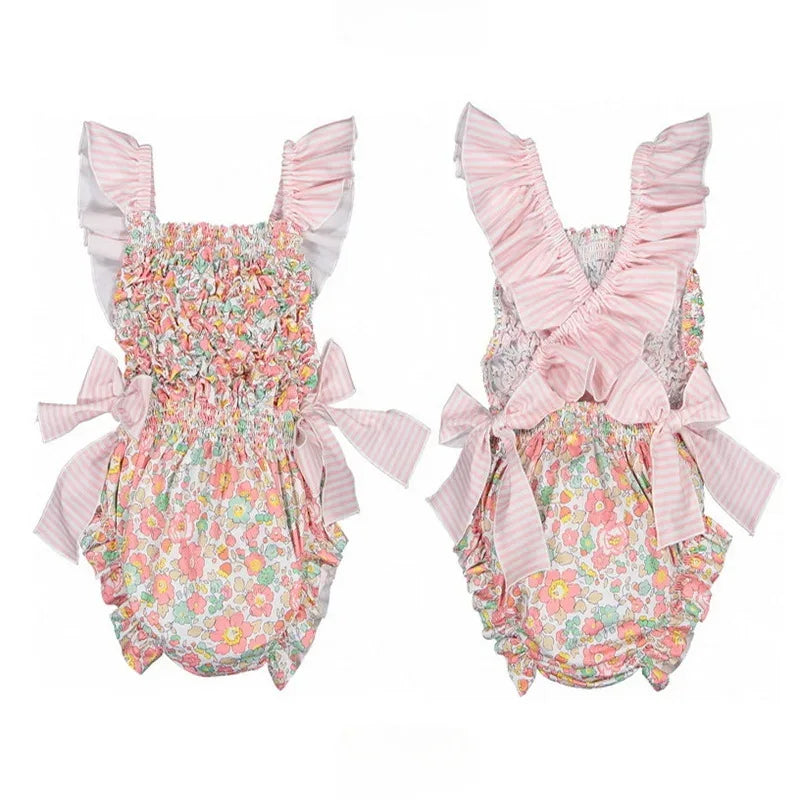 baby girls floral romper with pink striped ruffle straps and bow details romper