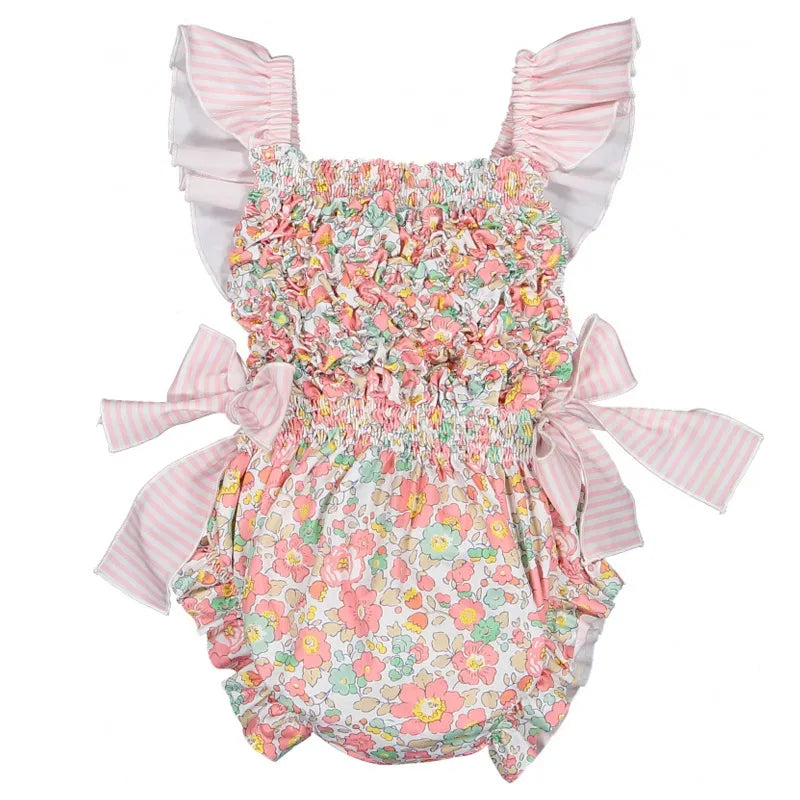 baby girls floral romper with pink striped ruffle straps and side bows