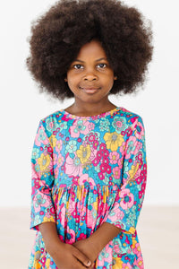 Girls floral twirl dress for girls by Mila and Rose with sleeves and colorful pocket design
