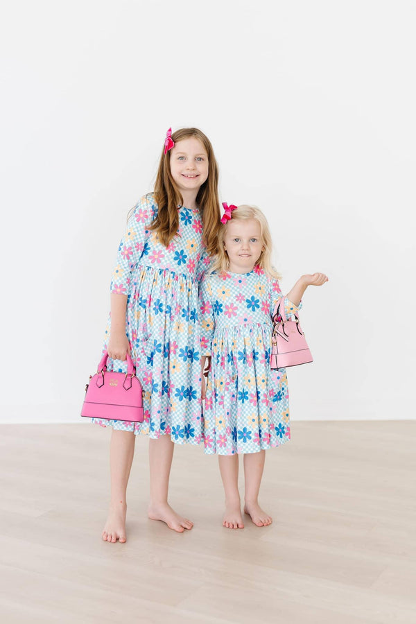 Girls floral twirl dress 3/4 sleeve in white with colorful flowers, sizes for young and older girls