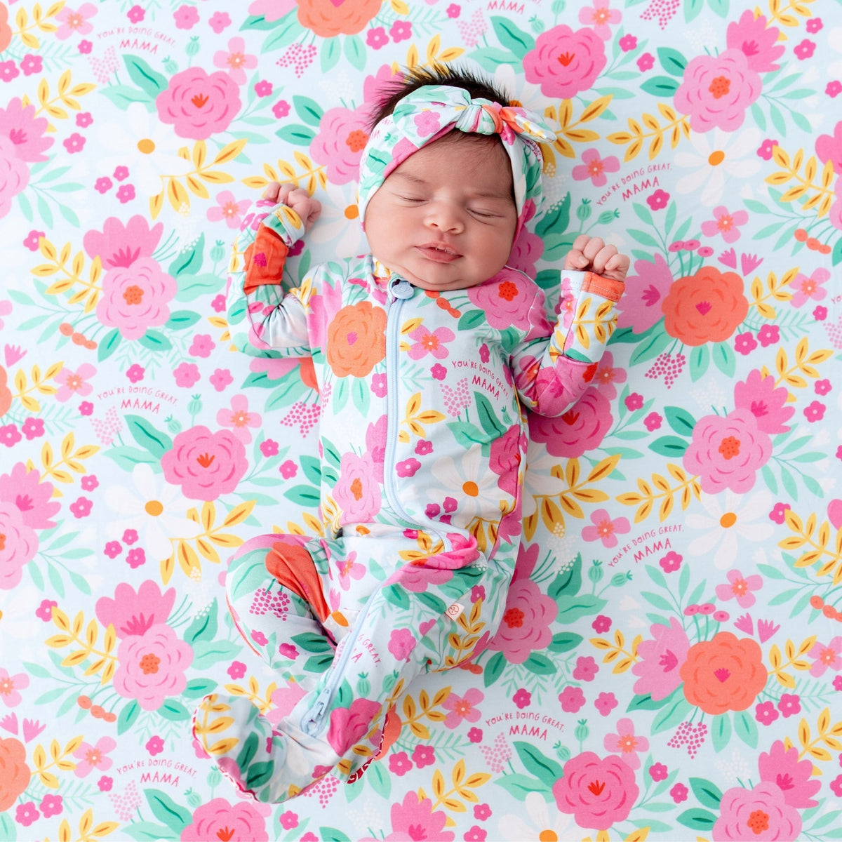 Infant wrapped in the Baby Swaddle Wrap – Flower Power Soft Bamboo Blend, ensuring warmth and comfort.
