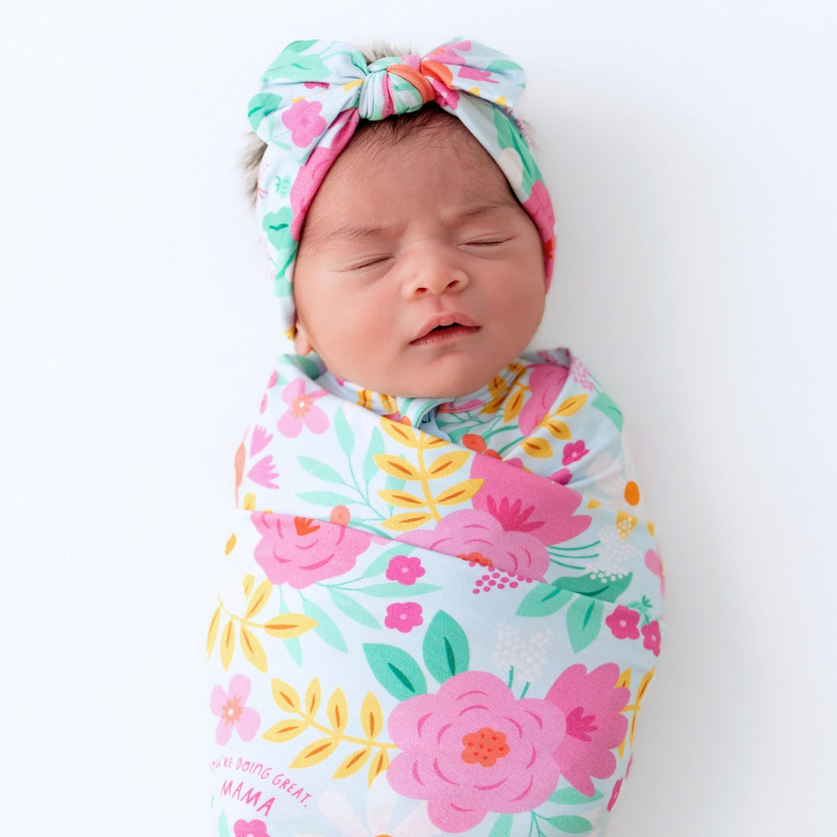 The Baby Swaddle Wrap – Flower Power Soft Bamboo Blend laid out flat, featuring its oversized 48" x 48" dimensions.