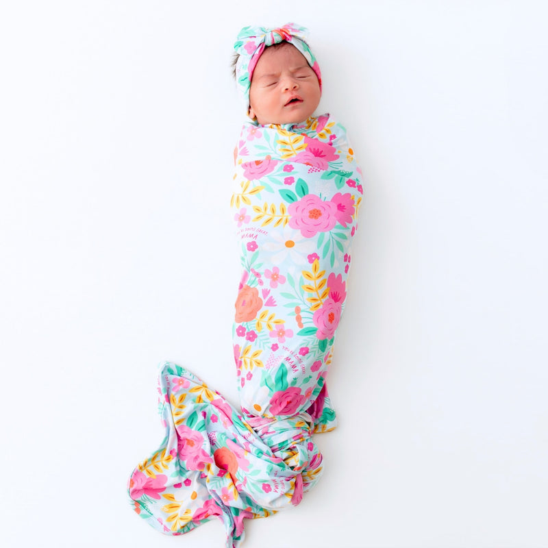 Baby Swaddle Wrap – Flower Power Soft Bamboo Blend featuring a floral design, perfect for keeping your baby cozy.