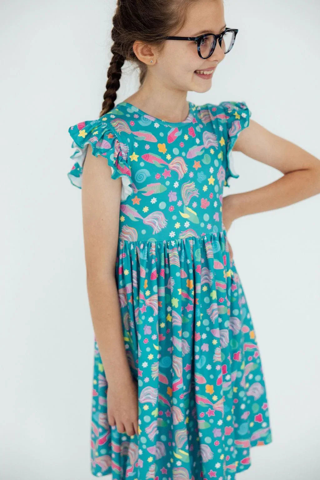 Girls teal flutter sleeve twirl dress for girls with colorful rainbow and star print, size toddler to youth