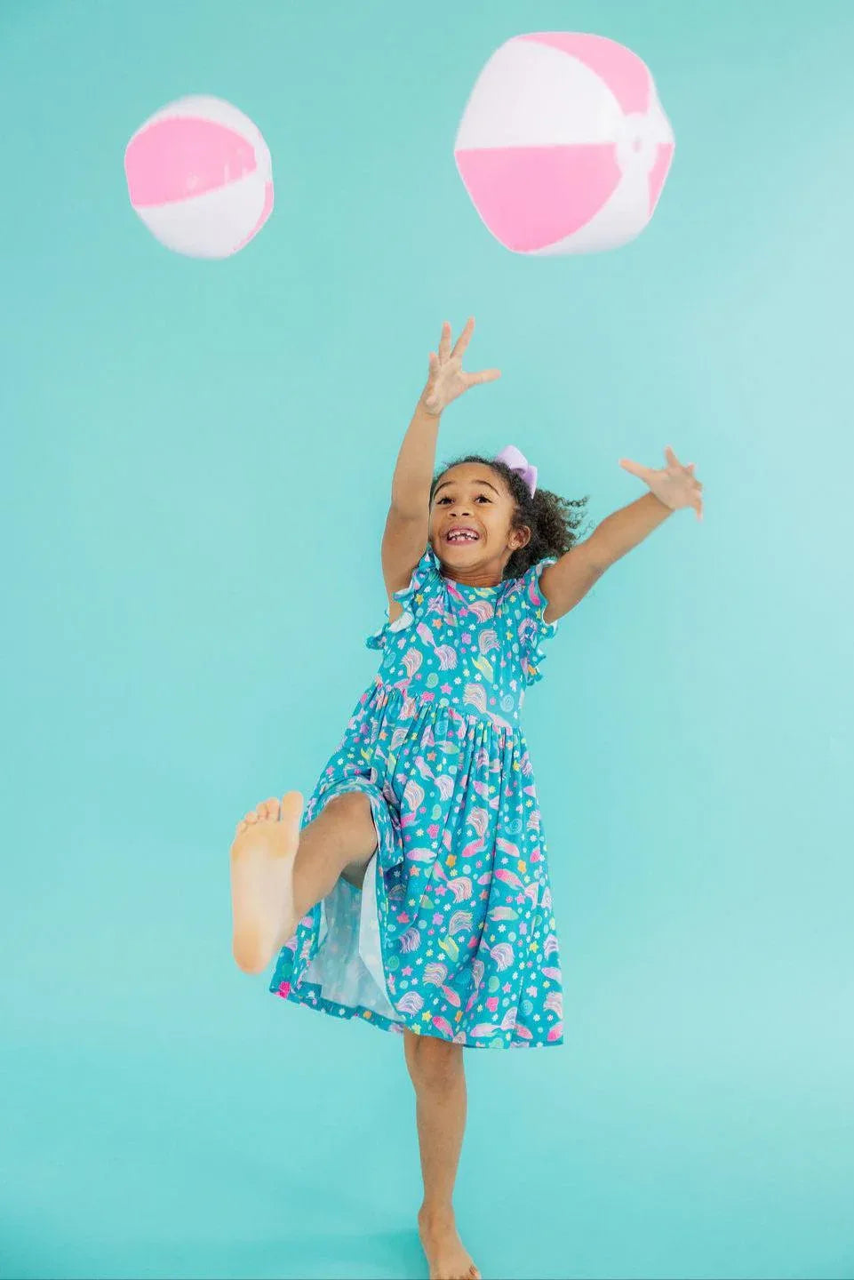 Girls blue flutter sleeve twirl dress with colorful print, playful design for young girls