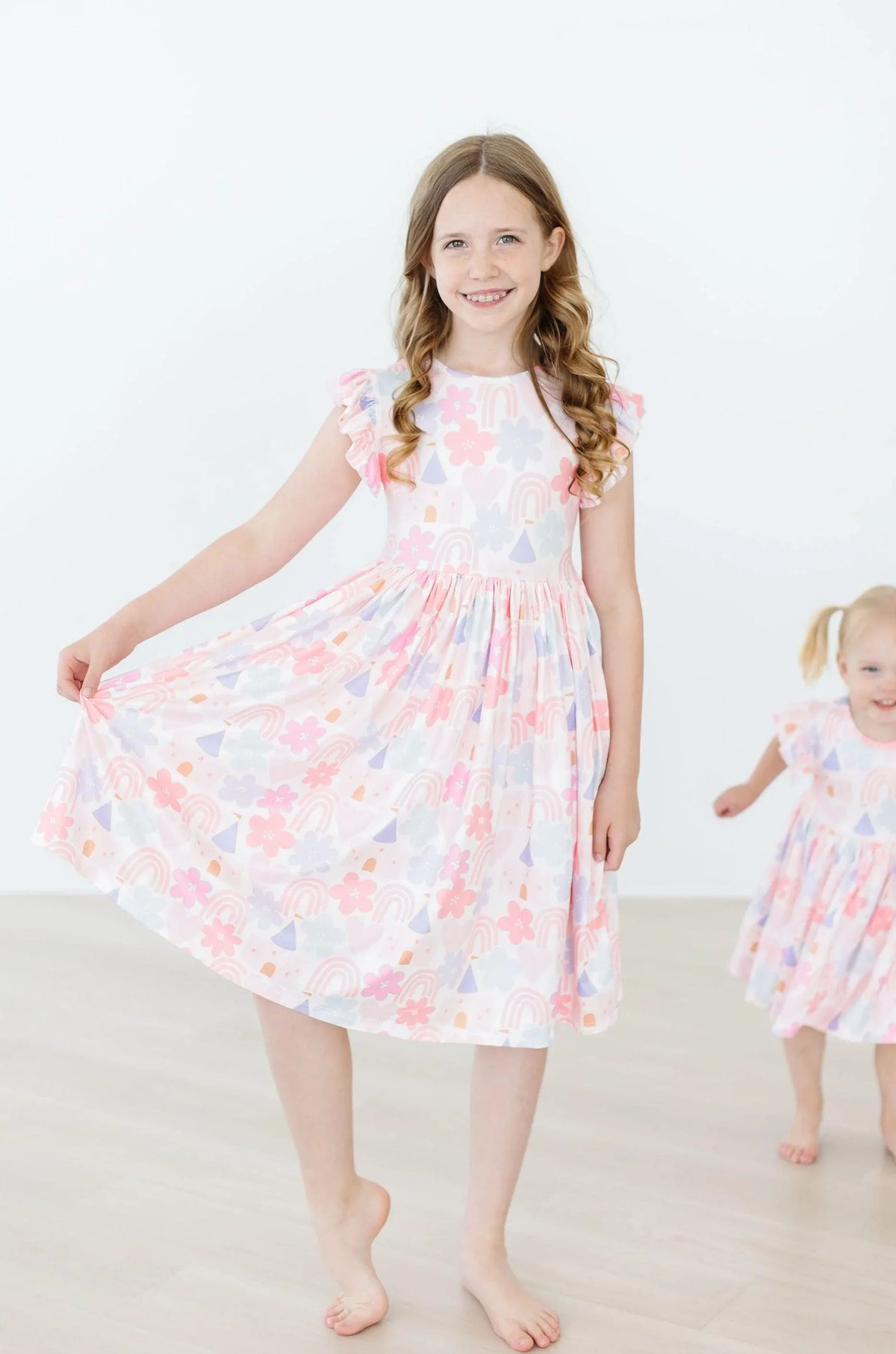Girls pastel floral flutter sleeve twirl dress for girls by Mila & Rose in size for ages 6-8