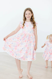 Girls pastel floral flutter sleeve twirl dress for girls by Mila & Rose in size for ages 6-8