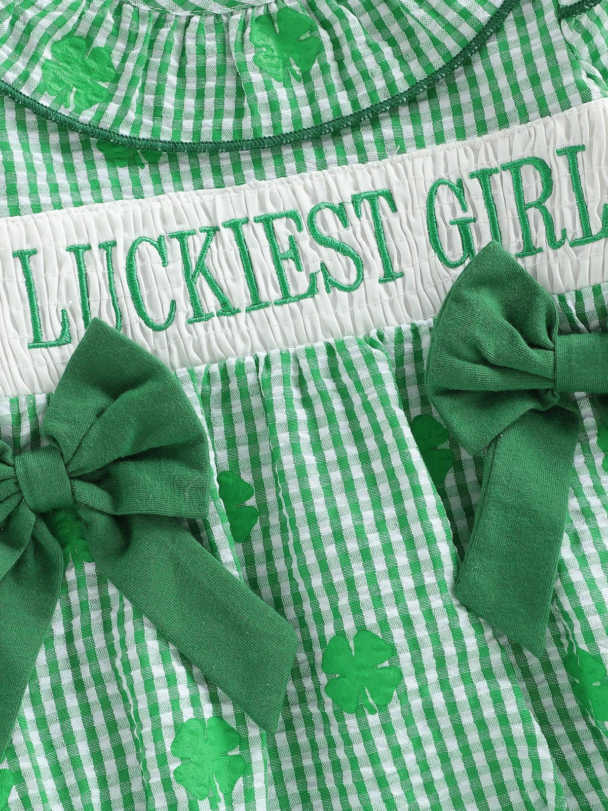 Green and white cotton frilly clover baby bubble romper with shamrock print and green bows