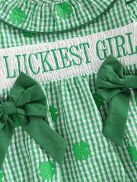 Green and white cotton frilly clover baby bubble romper with shamrock print and green bows