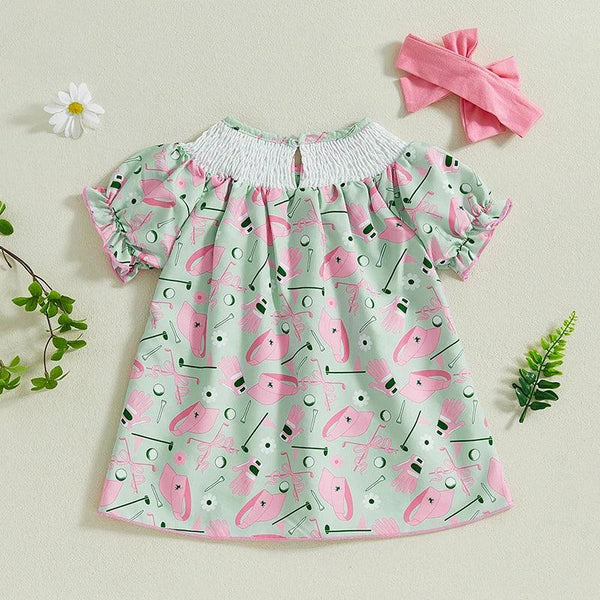 toddler girls green and pink golf dress with smocked white neckline and ruffle sleeves