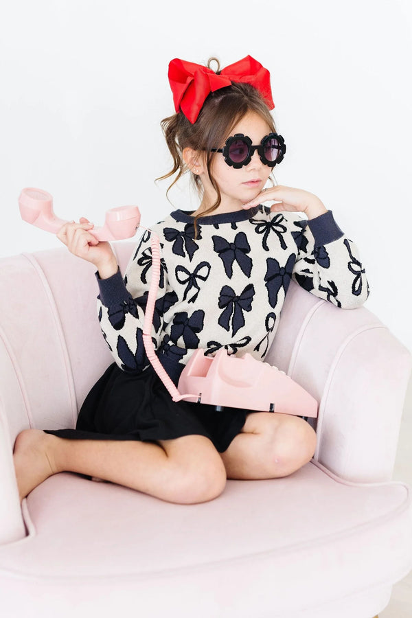 Girls cream and navy knit sweater with bow pattern long sleeve by Mila & Rose