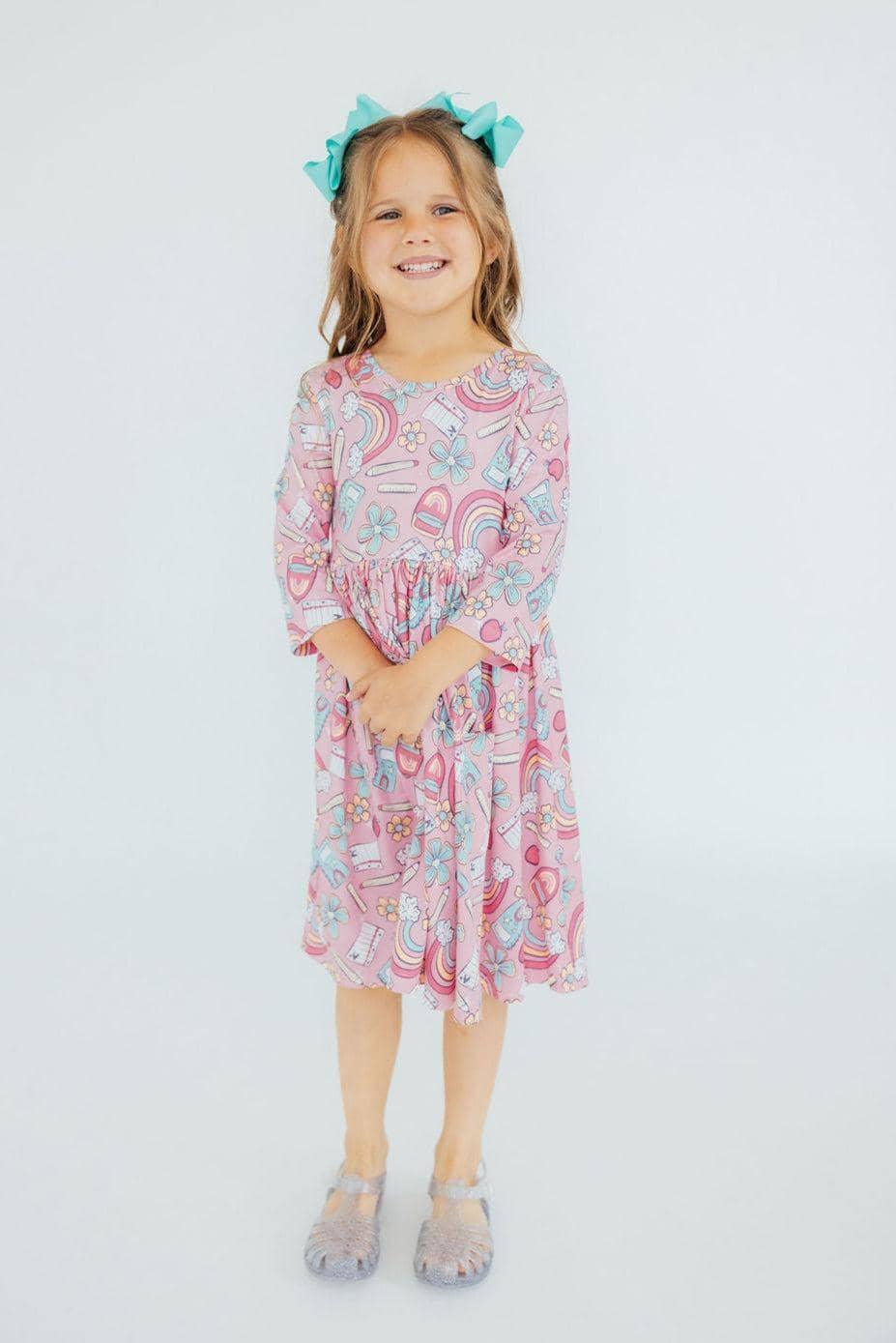 Girls pink Mila & Rose 3/4 sleeve twirl dress with colorful unicorn and rainbow print, size 6-7