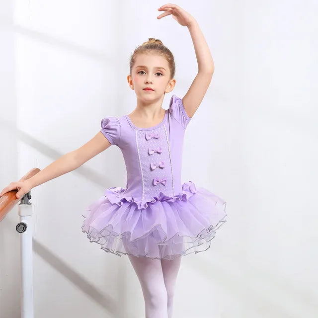 Girls ballet tutu dress in lavender with puff sleeves and bow details for ages 4 to 6