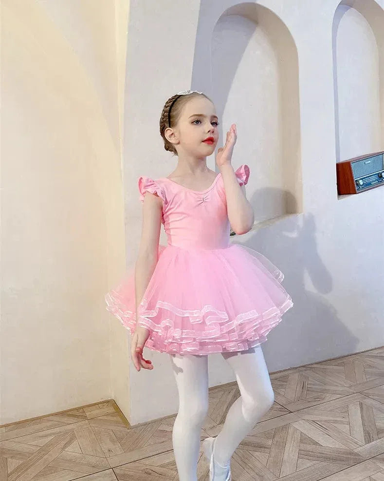 Girls pink ballet tutu dress for ages 4 to 6 with ruffled sleeves and layered tulle skirt