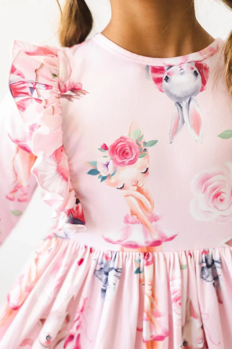 Girls pink ballet twirl dress with floral and bunny print, 3/4 sleeves and ruffle detail